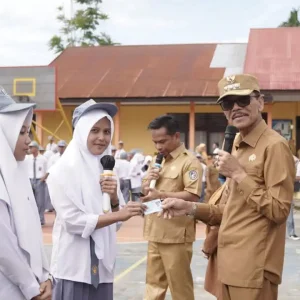 Dukcapil Goes To School, Bupati Launching Pelayanan Administrasi Kependudukan dan Penerapan IKD